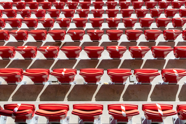 detail of chairs in the sport arena in red at grandstand - Photo, Image