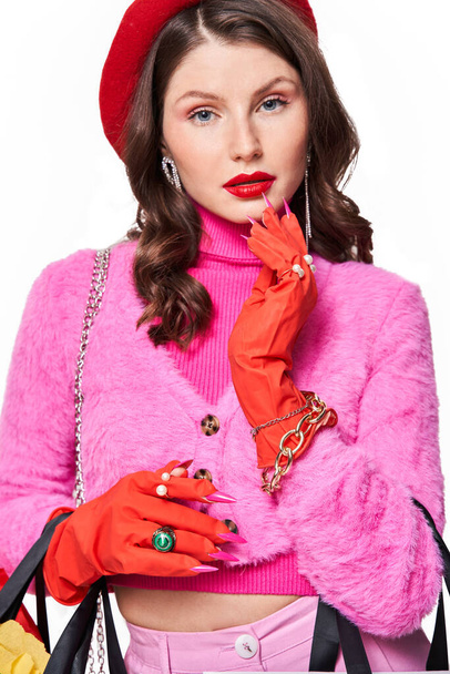 Woman wearing pink clothes posing to the camera - Foto, Imagen