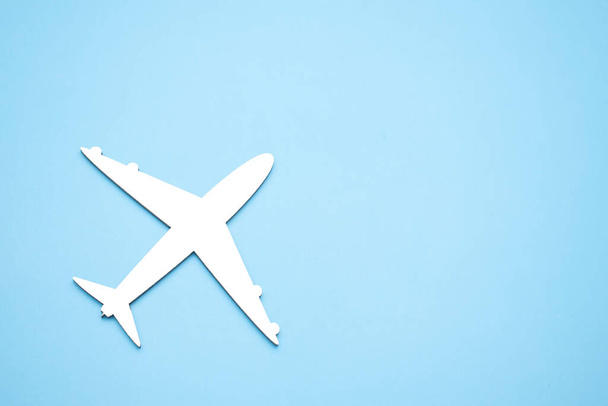 model of passenger plane on blue background - Zdjęcie, obraz