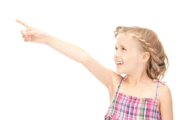Little girl pointing her finger - Fotoğraf, Görsel