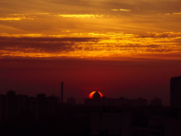 Sun rising over Kyiv city skyline, Ukraine - Photo, Image