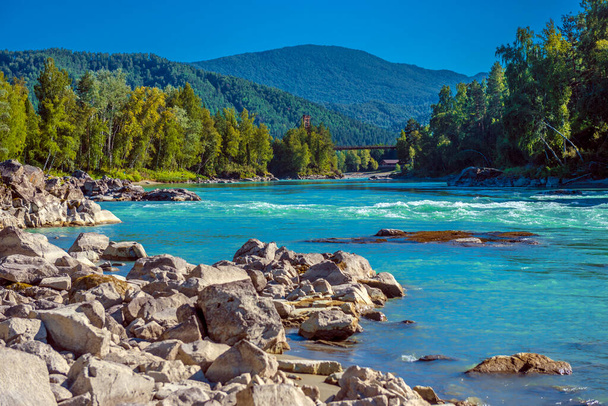 katun river with turquoise water and stones in the foreground - Photo, image