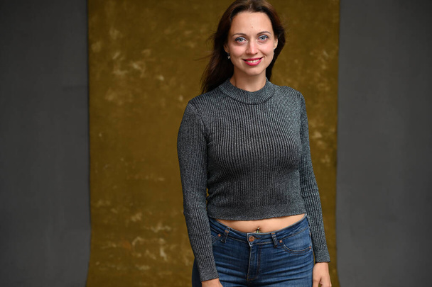 happy brunette woman with smile in studio - Photo, Image