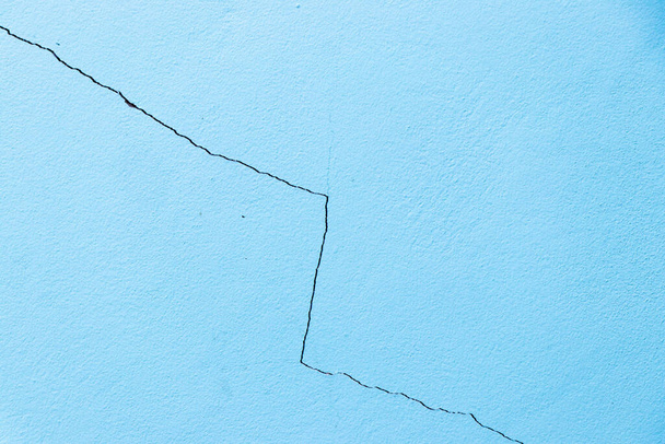 Blue color cracked concrete wall textured background - Фото, зображення