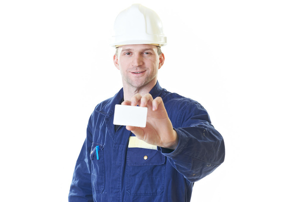 Builder man in blue robe with visit card - Foto, Bild