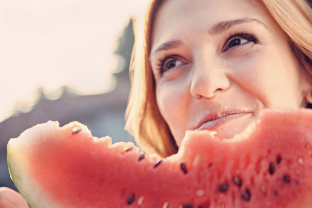 Woman Eating Watermelon - 写真・画像