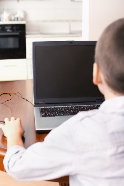 Boy playing a computer - Photo, Image
