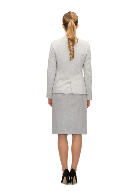 businesswoman or teacher in suit from back - Foto, afbeelding