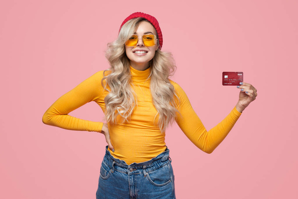 Trendy female hipster with bank card - Fotoğraf, Görsel