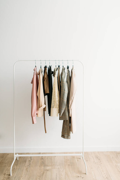 Rack with capsule clothes in beige colors - Fotografie, Obrázek