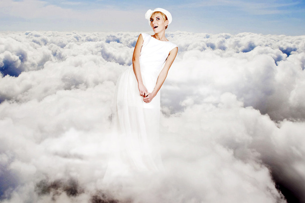Art collage. beauty young woman on sky - Foto, Imagem