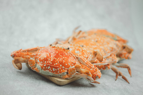 Steamed crab in a wood dish. Food concept background. Selective focus - Photo, Image