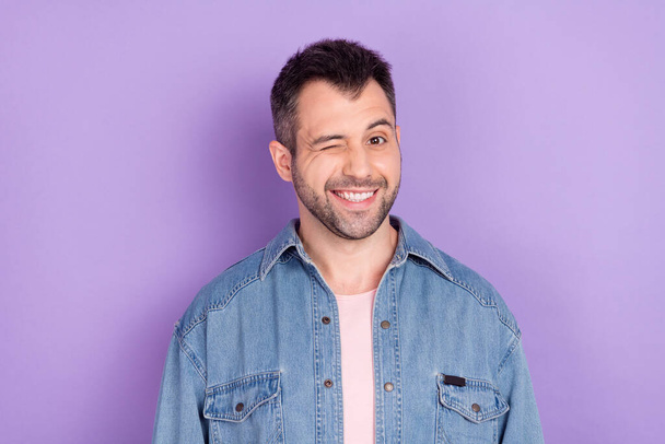Photo portrait brunet man in casual outfit smiling cheerful winking isolated pastel purple color background - Foto, Imagen