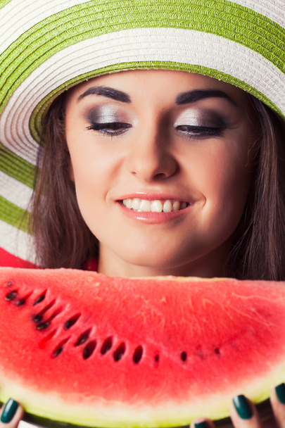 Young woman holding watermelon - Photo, Image