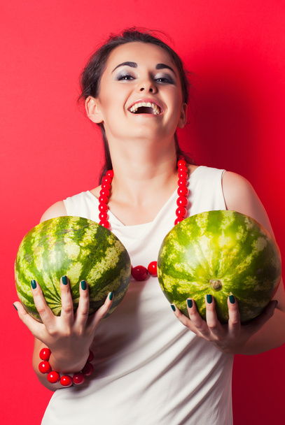 Young woman holding watermelons - Φωτογραφία, εικόνα