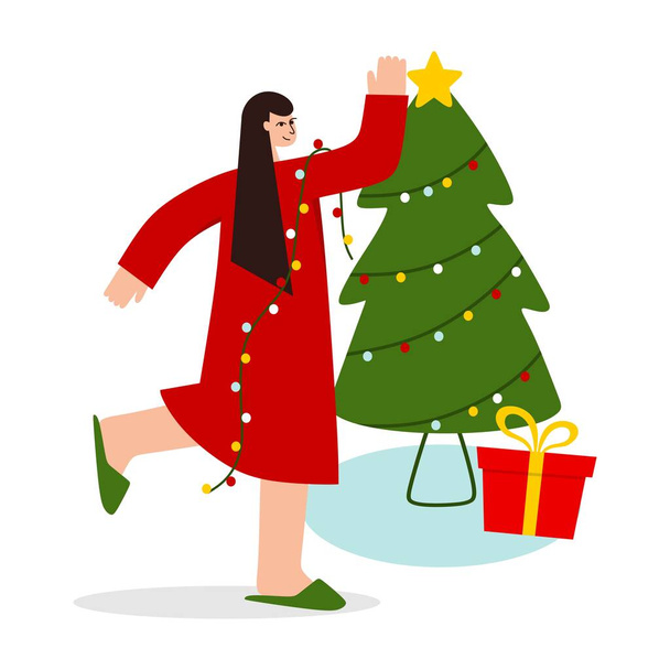 A girl dresses up a Christmas tree. The concept of Christmas and New year.  - Vector, Image