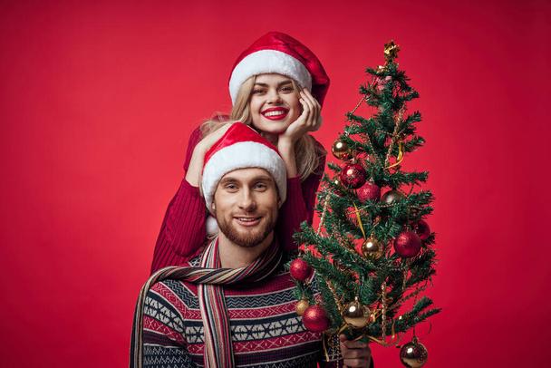 陽気な若いカップルのロマンスクリスマス休暇家族 - 写真・画像