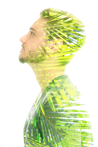 Double exposure portrait of a man isolated on a white background - Photo, image