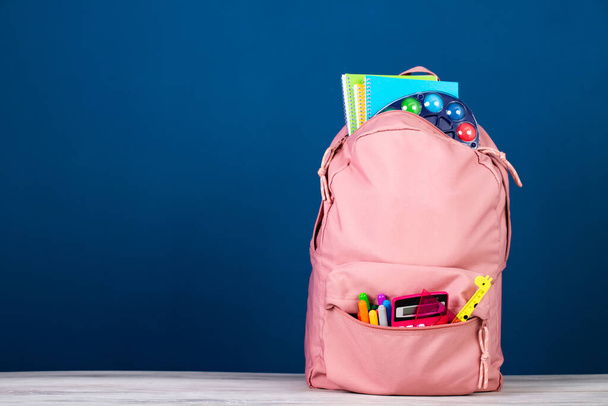 Back to school concept. Backpack with school supplies. - Zdjęcie, obraz