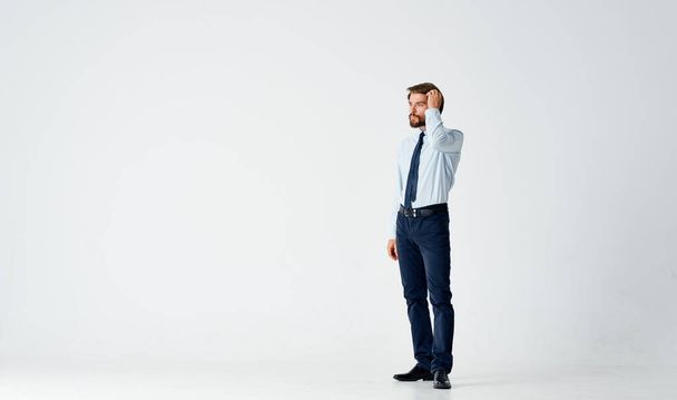 business man in shirt with tie fashion posing studio full length - Foto, afbeelding
