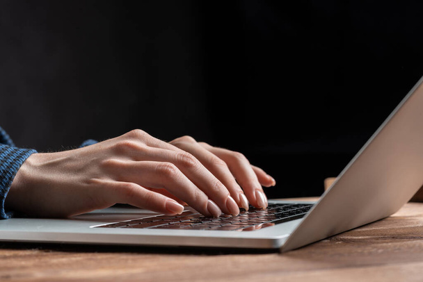 Close up woman hands lying on laptop keyboard - Фото, зображення