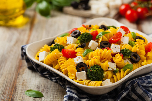 Salad with pasta and feta cheese. Front view.  - 写真・画像