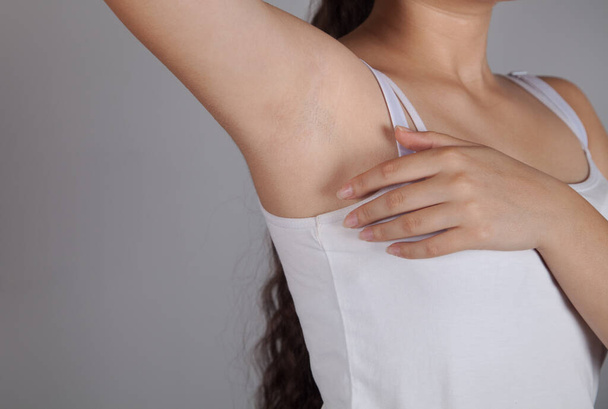  Woman showing her smooth armpit.  - Photo, Image