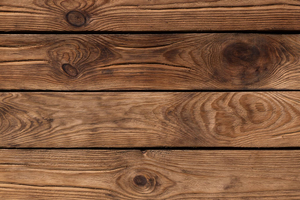 detail of brown wooden wall made of planks - Фото, изображение