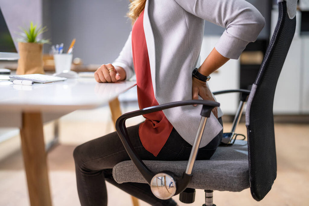 Back Pain Bad Posture Woman Sitting In Office - Foto, imagen