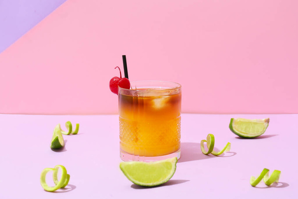 Glass of tasty mai tai cocktail on color background - Foto, Imagen