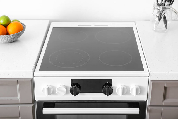 Modern electric stove in kitchen - Photo, Image