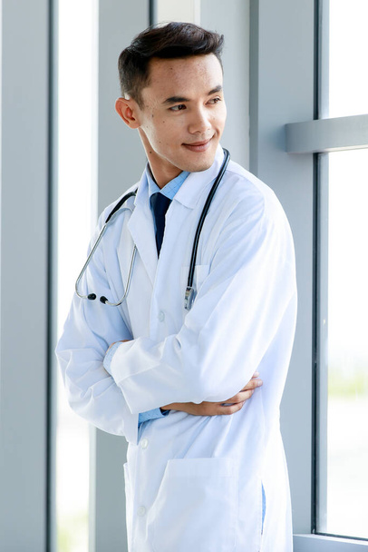 asian doctor standing and look smart - Photo, Image