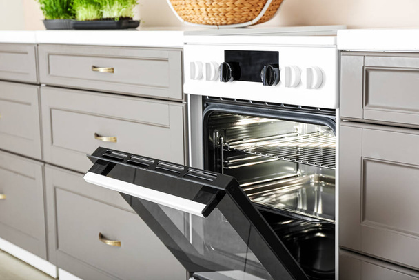 Modern electric oven in kitchen - Photo, Image