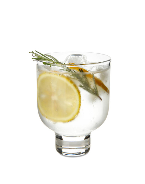 Glass of cold gin and tonic on white background - Φωτογραφία, εικόνα