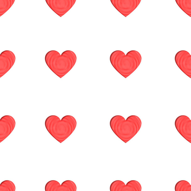 Valentijnsdag naadloos patroon. Papierkunst rood hart geïsoleerd op witte achtergrond. Hartvorm bovenop afgezwakt in rood water met rimpelingen en golven. - Foto, afbeelding
