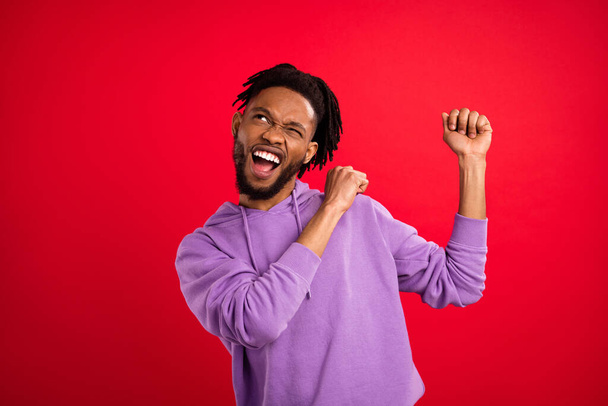 Photo portrait man smiling dancing at party looking copyspace isolated vibrant red color background - Fotoğraf, Görsel