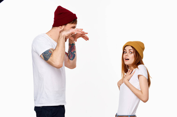 cheerful young couple white t-shirts in fashionable clothes modern style - Photo, Image