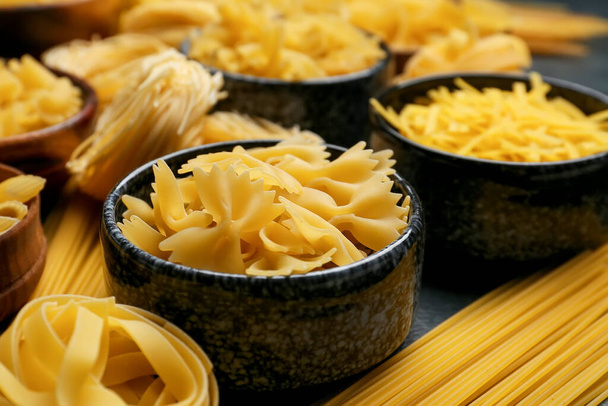 Uncooked farfalle pasta in bowl - Photo, Image