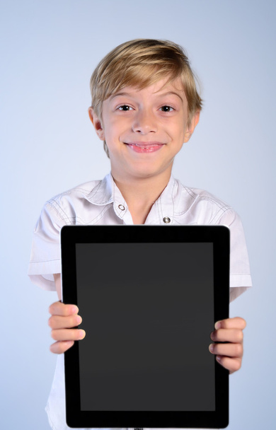 Young boy showing tablet - Φωτογραφία, εικόνα