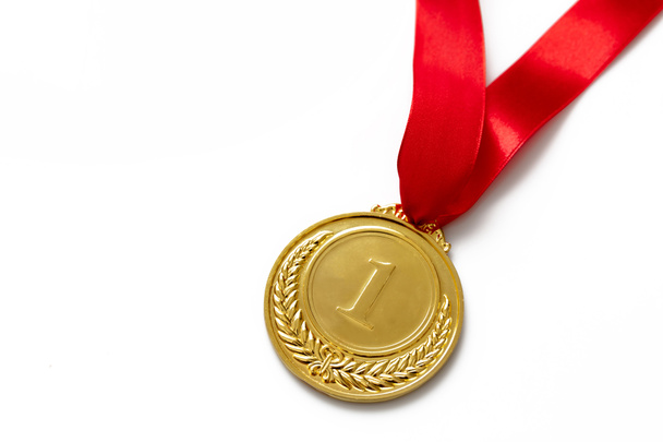 Gold medal, number one laurel wreath and red color ribbon isolated on white background, Champion first place winner athlete. Prize in sport trophy award, copy space, template. - Photo, Image