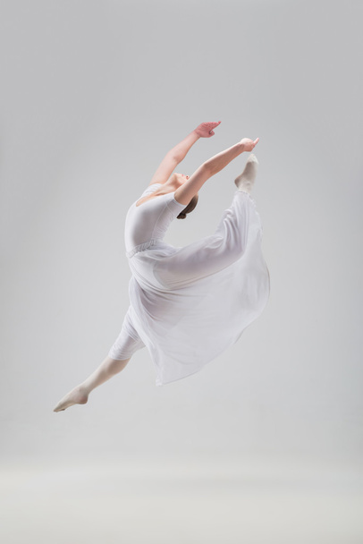 Young and beautiful ballet dancer posing isolated - Foto, afbeelding