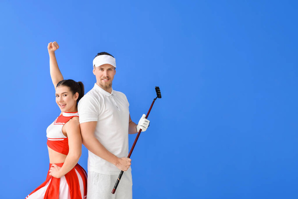 Pompomlány és golfozó a színes háttér - Fotó, kép