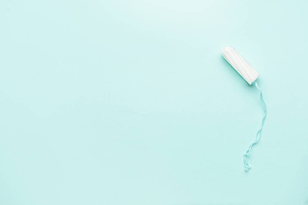 Tampon on color background, top view - Photo, Image