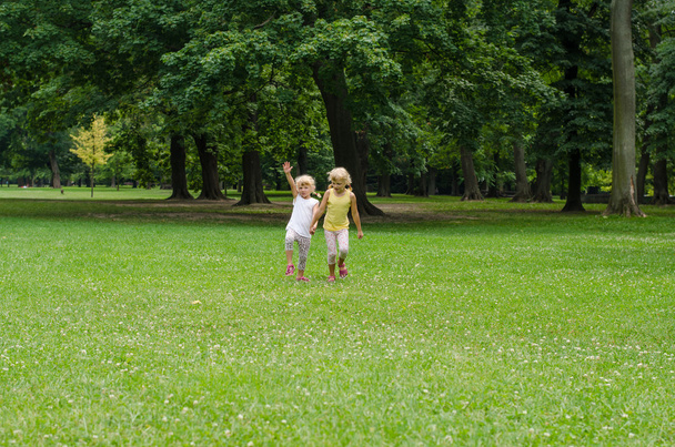 two girls in park - Φωτογραφία, εικόνα