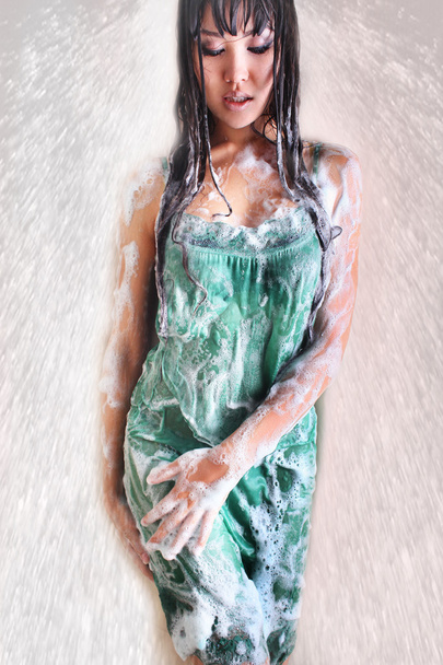 Wet model in soapsuds - Photo, Image