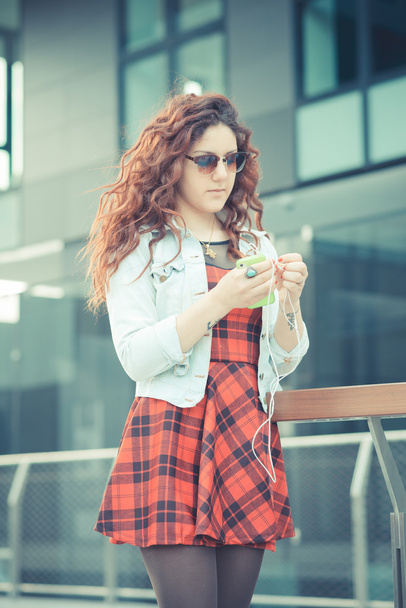 Woman with red curly hair - 写真・画像