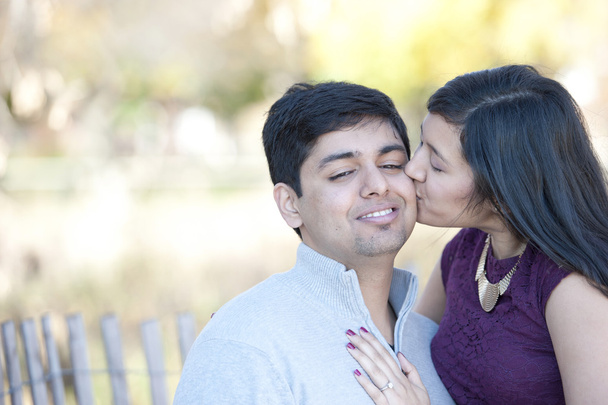 A Young Happy Indian Girl Kissing Her Fiance - Photo, Image