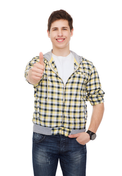smiling student boy showing thumbs up - Fotó, kép