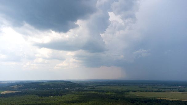 Panoramic landscape sky, stormy rain clouds, rain, land, forest - Photo, Image