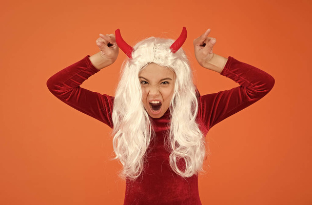 angry imp with red horns. devil costume. happy halloween. creepy child in devil horns. kid has white hair wig. childhood happiness. teen girl ready to celebrate costume party. Ghosts have real spiri - Fotoğraf, Görsel